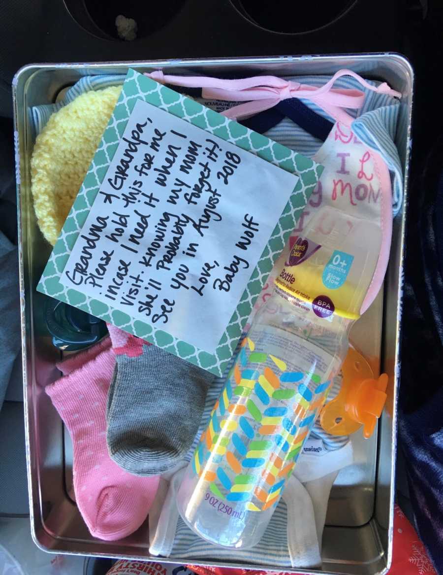 Care package of baby items meant for grandpa and grandma for when their grandchild stays with them