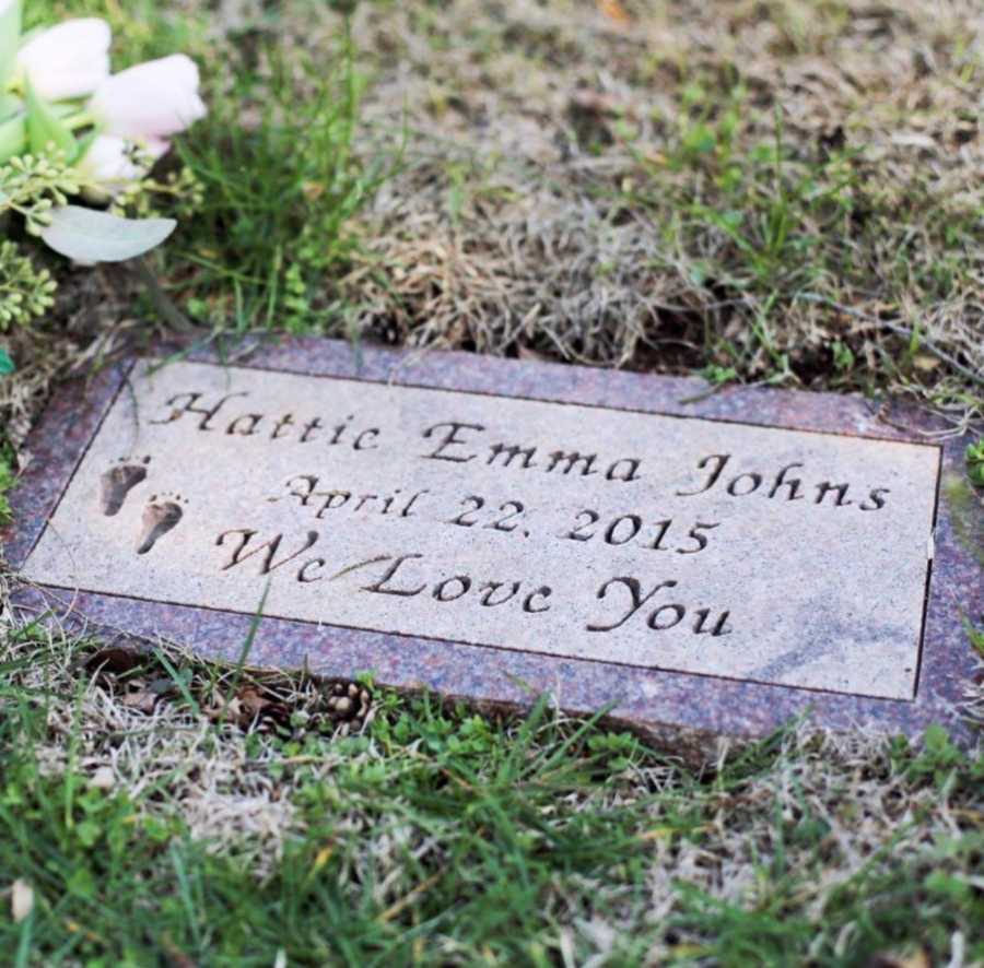 Newborn's grave that says, "Hattie Emma Johns April 22, 2014 We Love You"