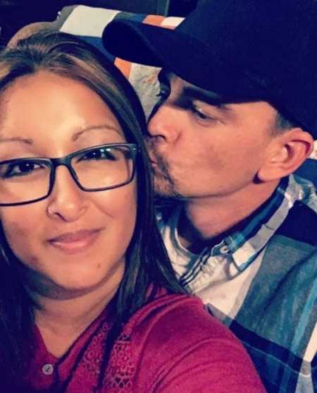 Woman who lost her little brother in car crash receives kiss on cheek from husband