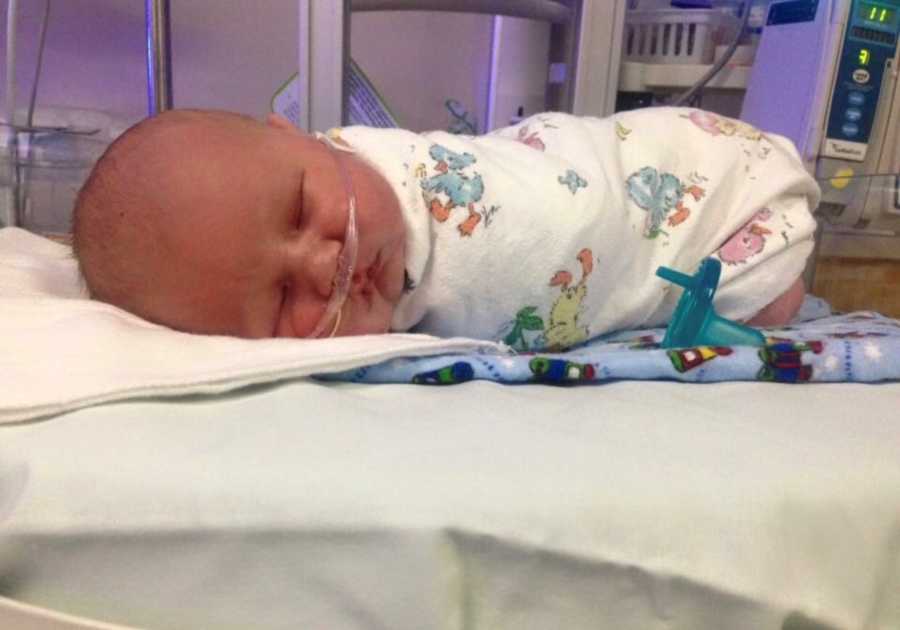 Newborn baby sleeping in NICU whose mother had miscarriages before him