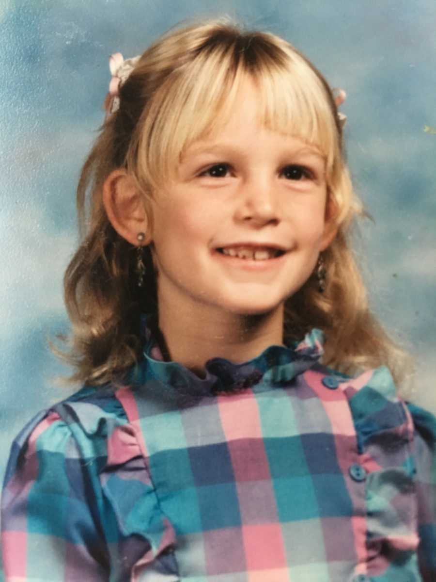 Woman who has bipolar disorder smiling as young girl