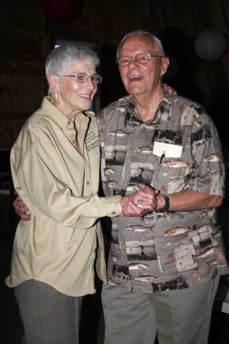 Man smiles while dancing with wife before she got dementia