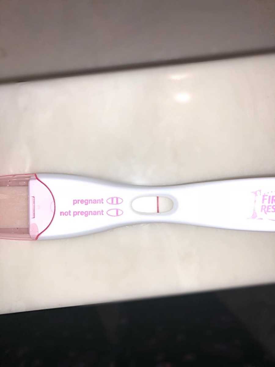Negative pregnancy test laying on counter