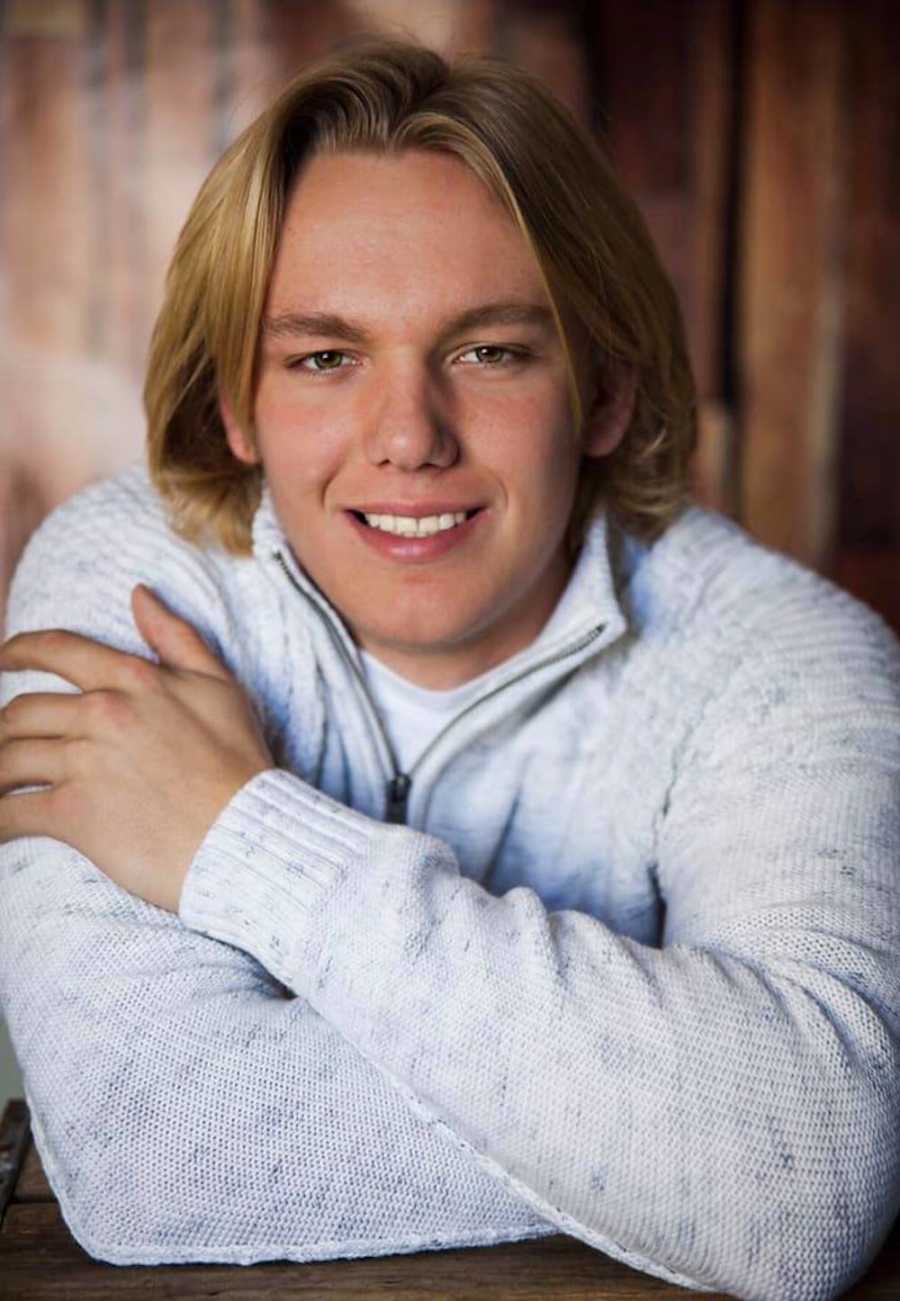 Teen smiling and posing for photoshoot who has since passed from trying a drug