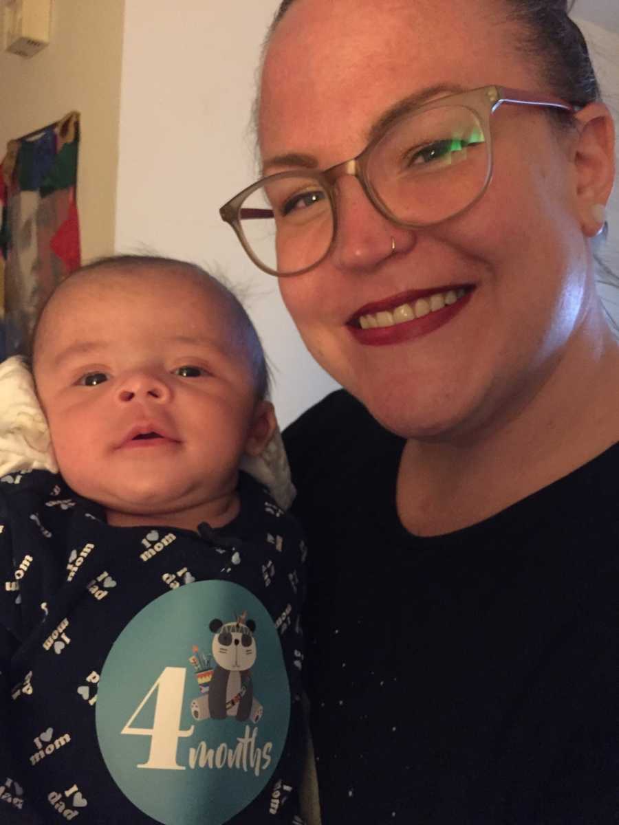 Mother smiles in selfie with son who has shaken baby syndrome
