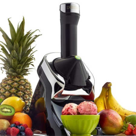 Yonanas machine surrounded by fruit