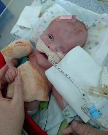 Newborn boy lying in NICU who didn't make it