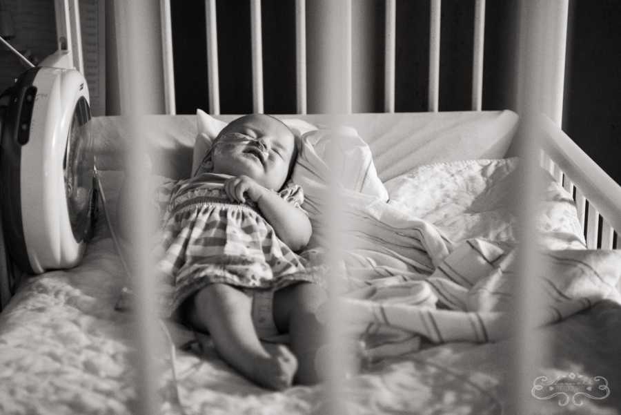 Baby girl who was shaken lays in hospital crib sleeping