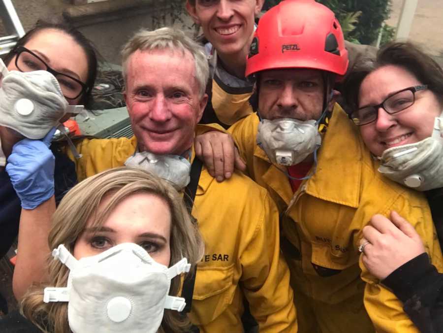 EMS nurses smiles in selfie with fire fighters she saved