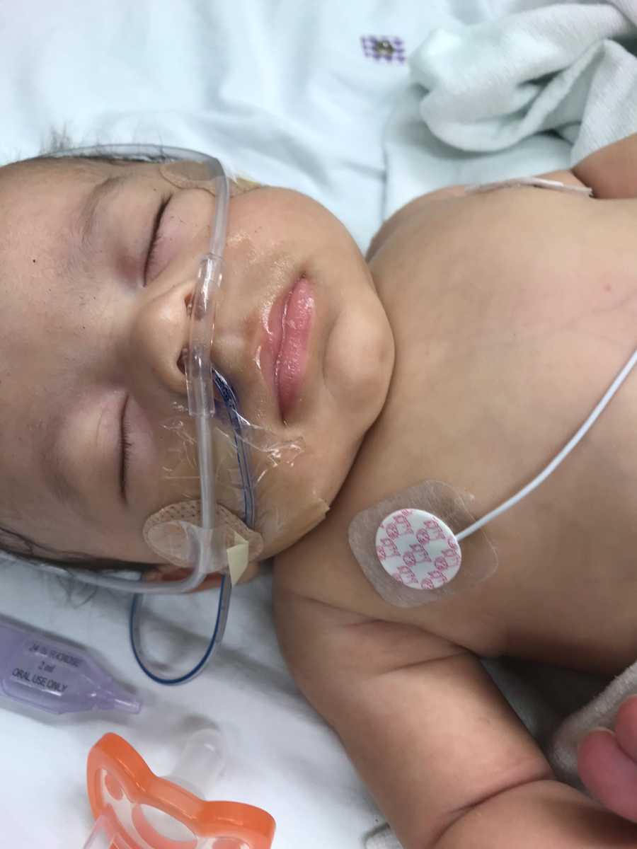 Baby lying in hospital who was almost shaken to death