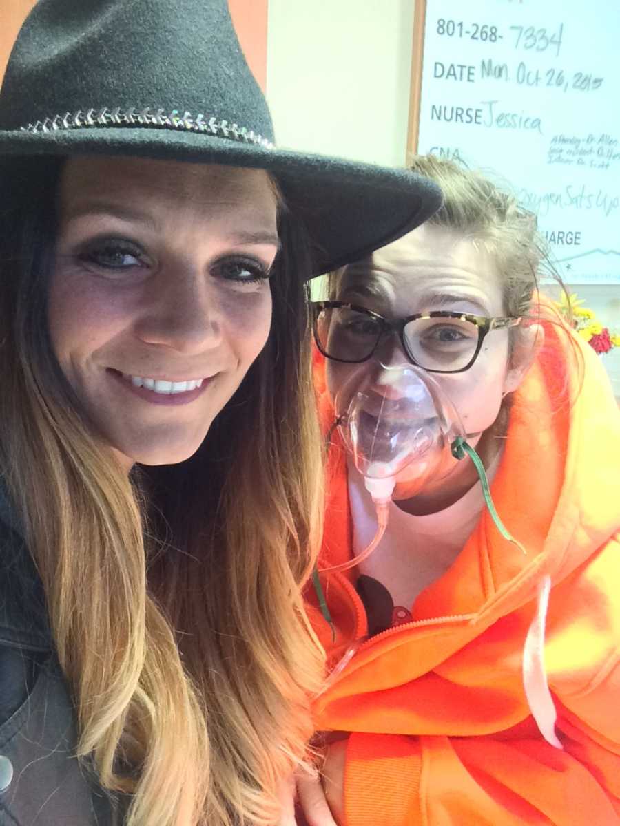 Woman smiles in selfie with sister in hospital who abuses drugs