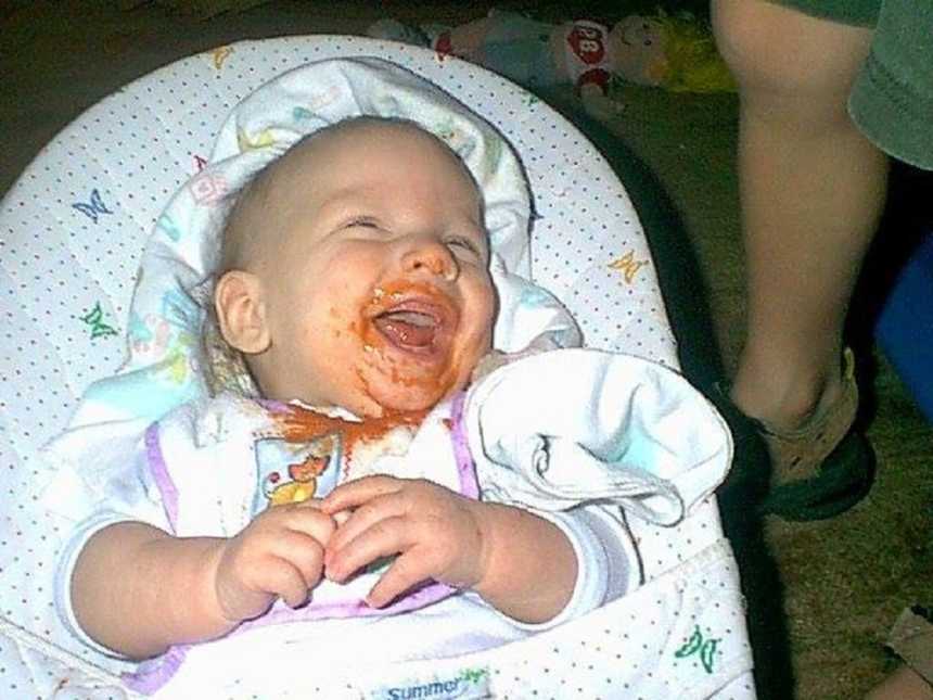 Baby recovered from shaken baby syndrome smiles with Spaghettios all over his face