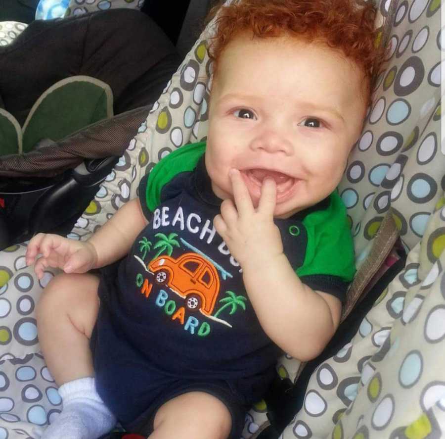 black baby with red hair