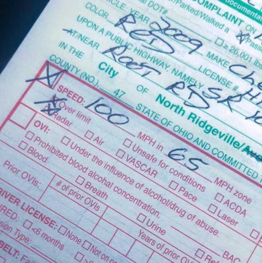 Close up of police ticket saying driver was going 100 in 65 mph zone