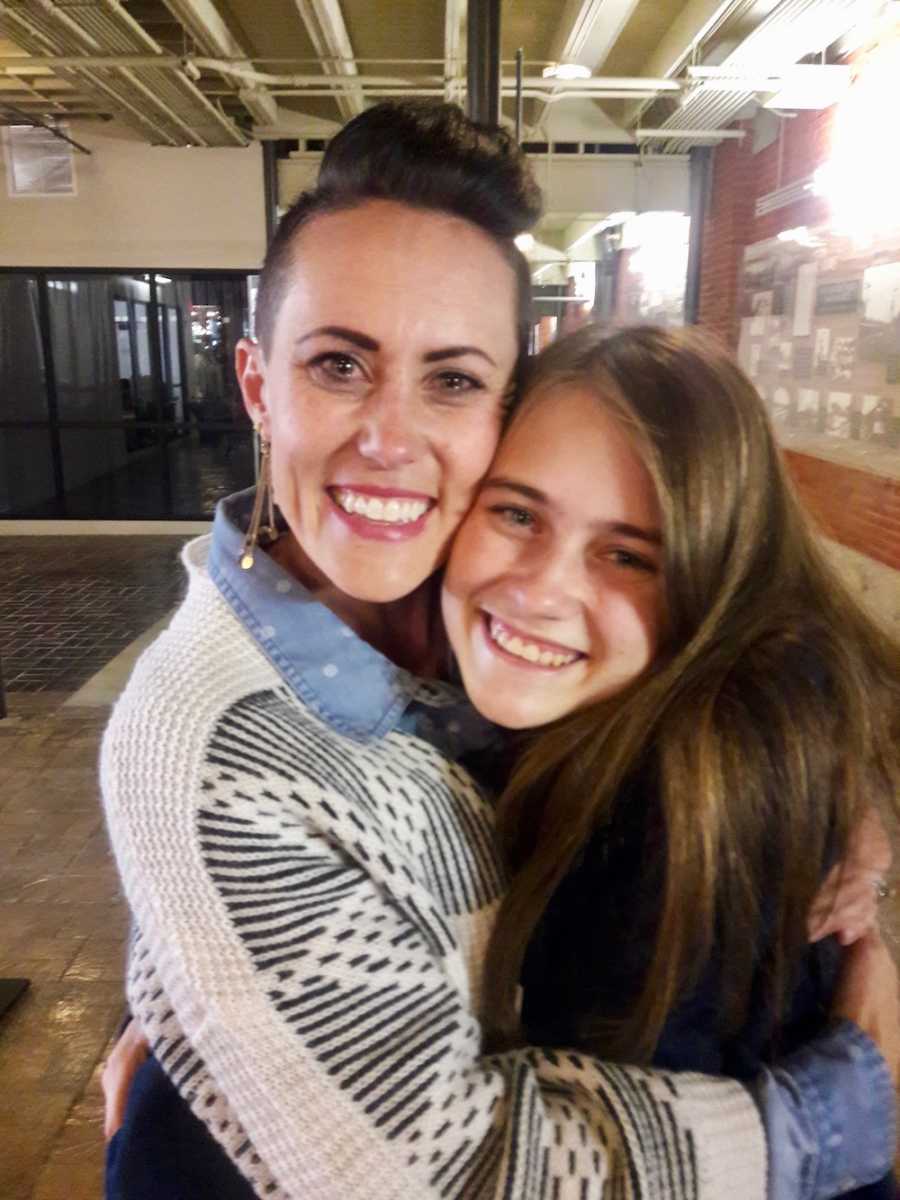 Woman hugs teen she gave up at birth at reunion