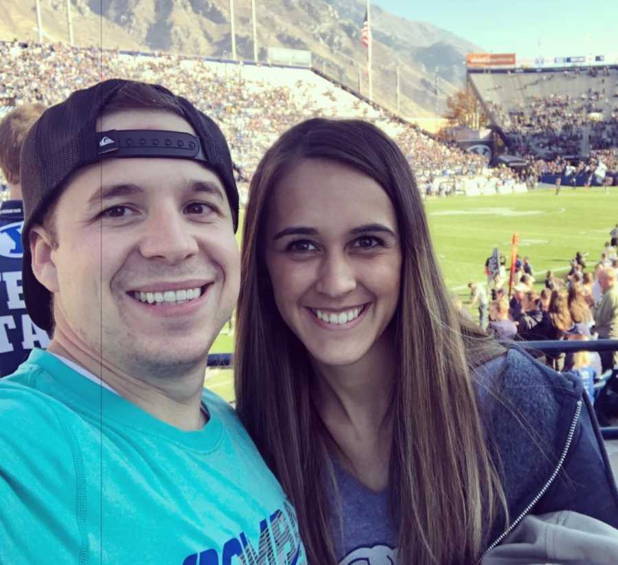 Husband and wife take selfie in BYU Football stadium