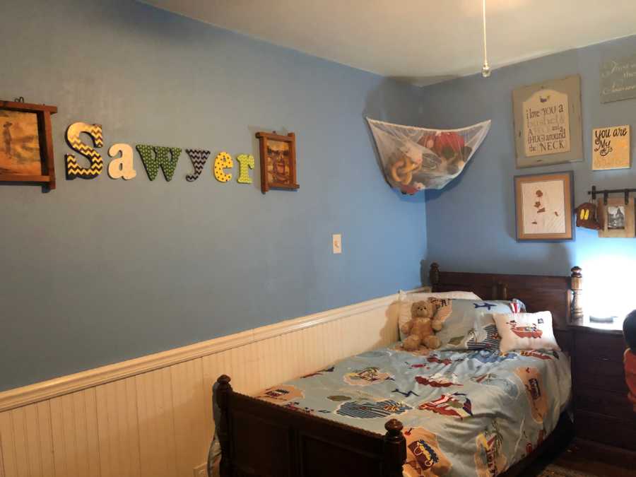 Mother's childhood bed now in son's room