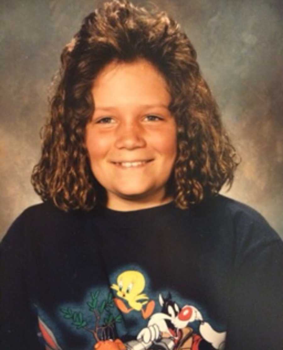 Teen smiles for school picture