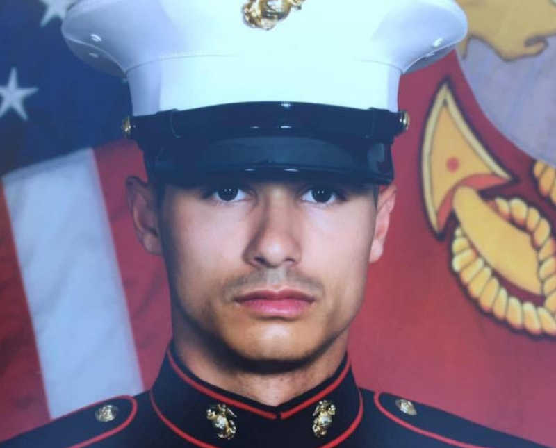 Marine man in uniform with straight face