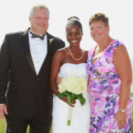 Bride who was once refugee stands beside her US host parents