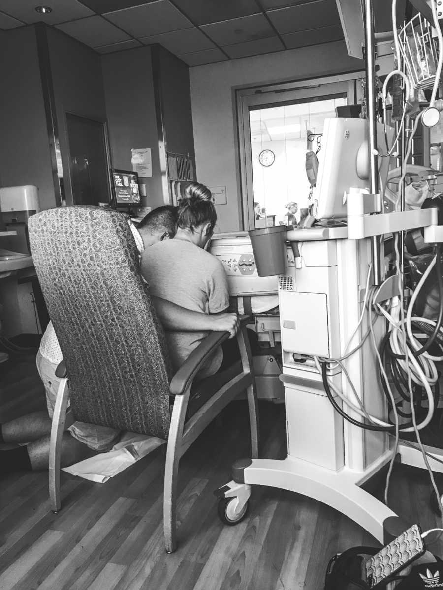Mother and father sit in PICU watching son who had two heart attacks