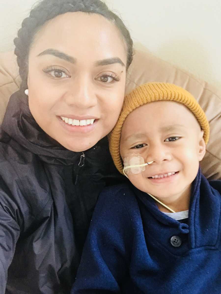 Mother smiles in selfie with son who has cancer 