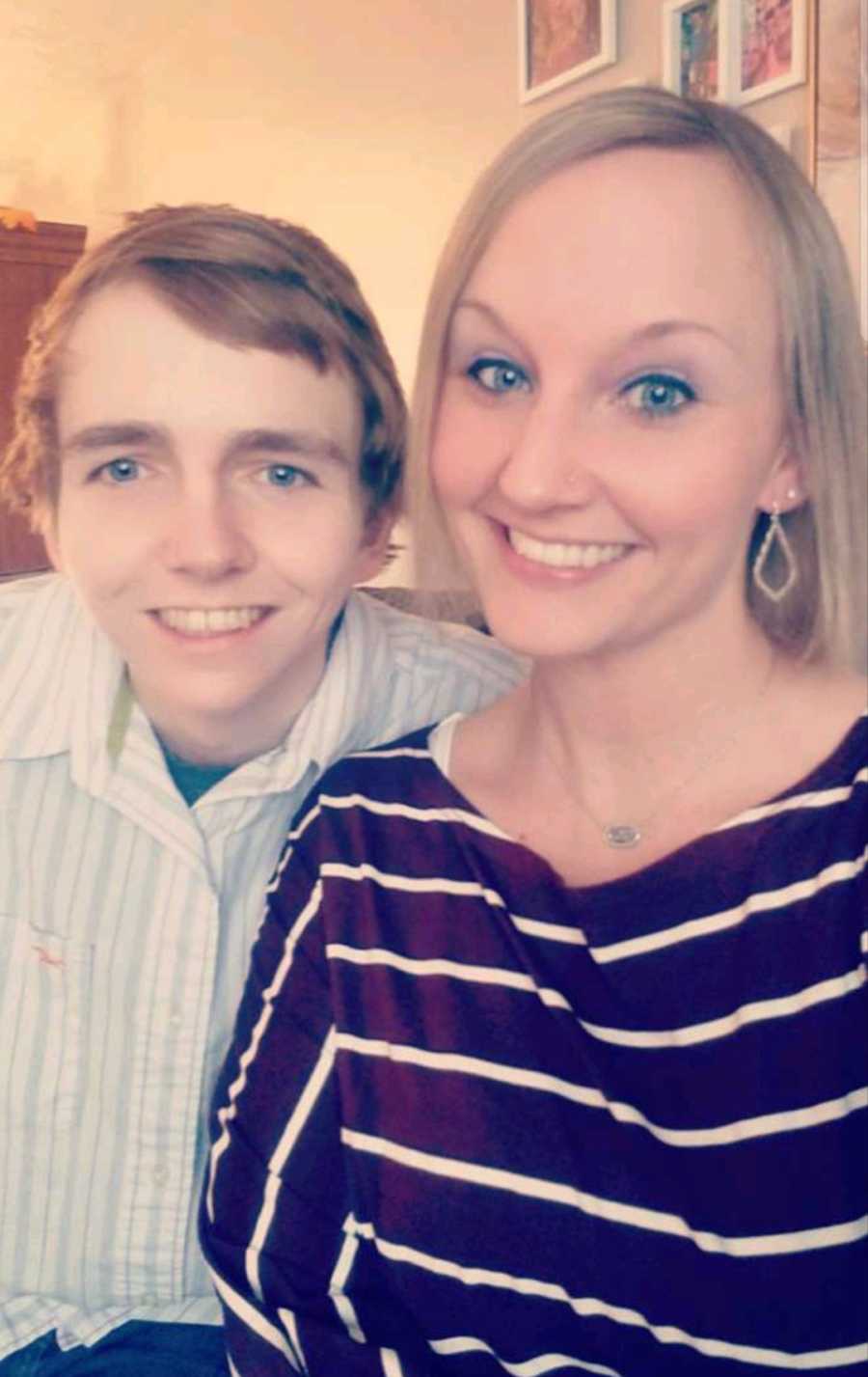 Young woman smiles in selfie with brother who will become addicted to drugs