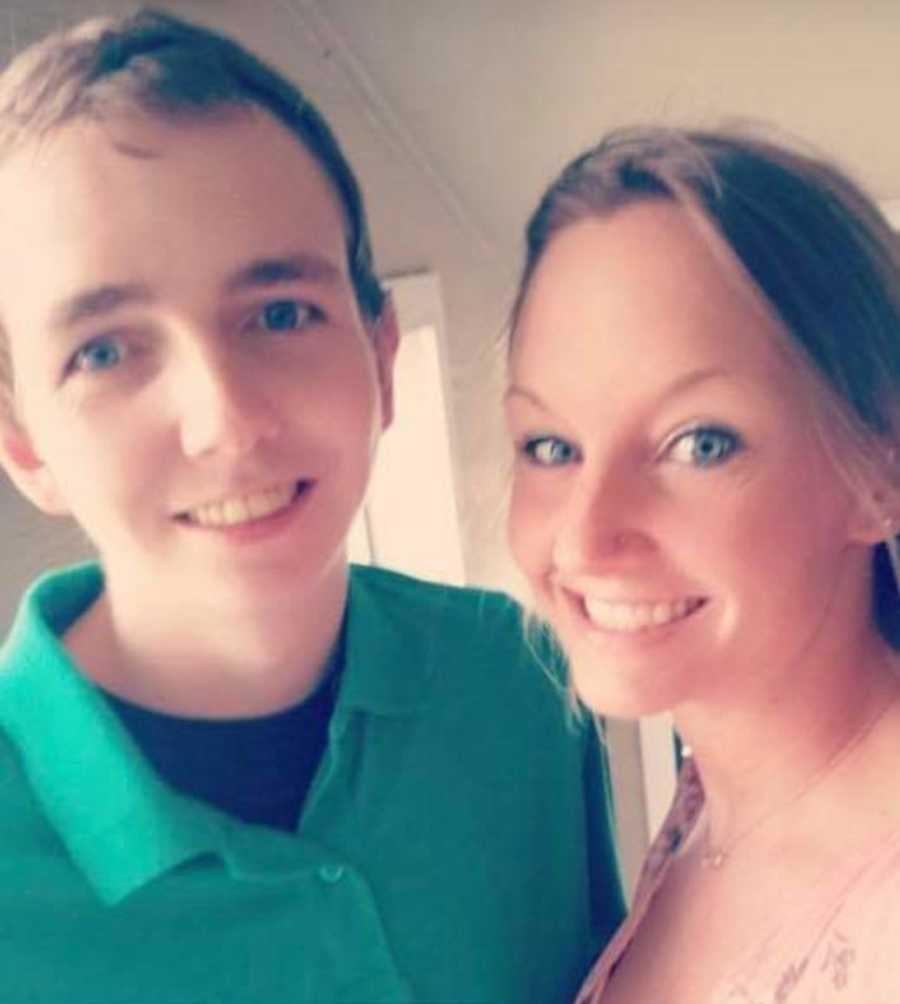 Woman smiles in selfie with brother who is addicted to drugs