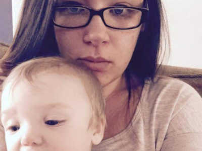 Woman who thanks husband's mistress for saving her life takes selfie with baby on her lap