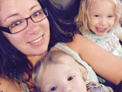 Mother who left abusive husband smiles in selfie with two young kids