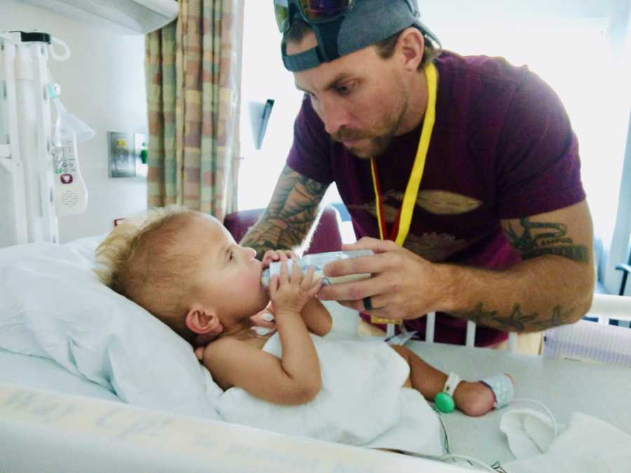 Father bottle feeds baby that lays in PICU with unknown disease