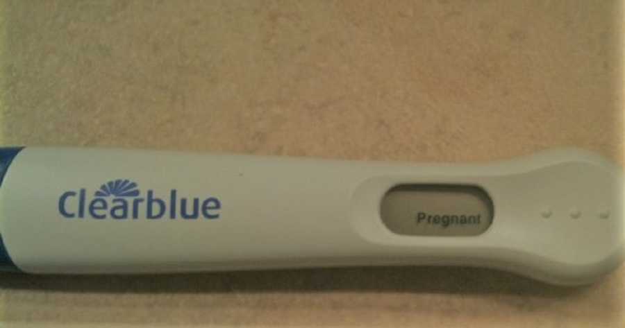 Clear blue pregnancy test that says, "pregnant"