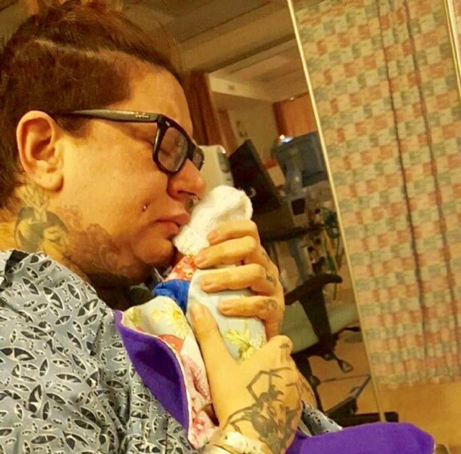 Mother sits in hospital holding newborn who won't live long