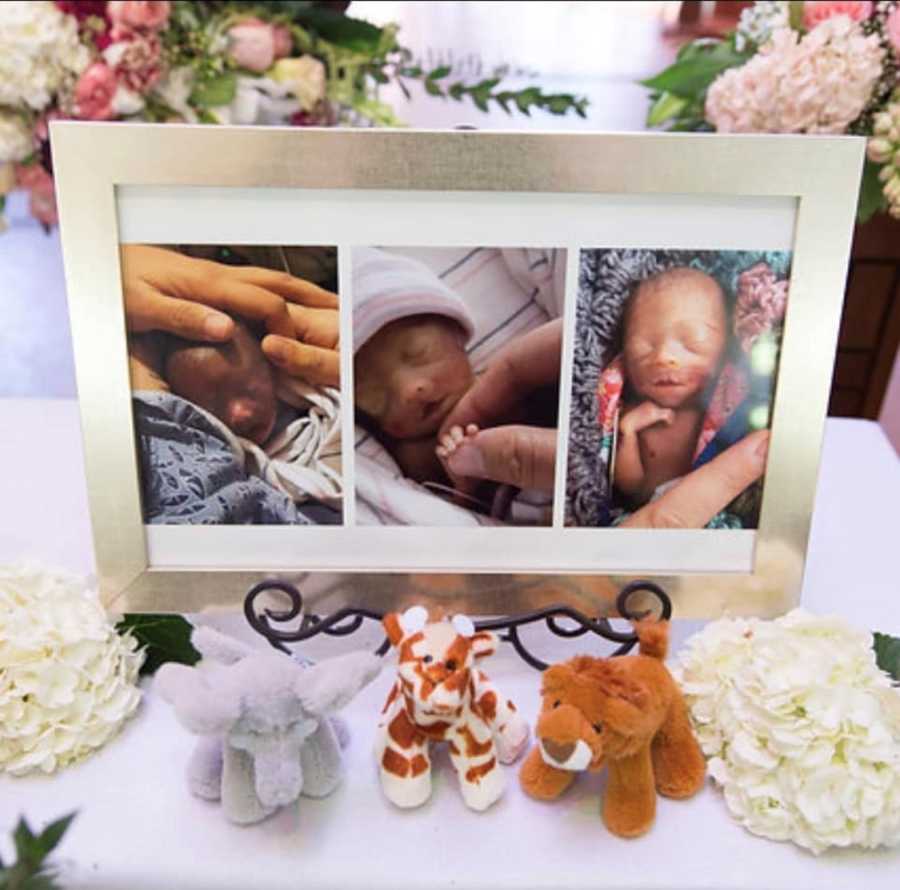 Picture frame rests on table with pictures of wives three lost babies and three stuffed animals