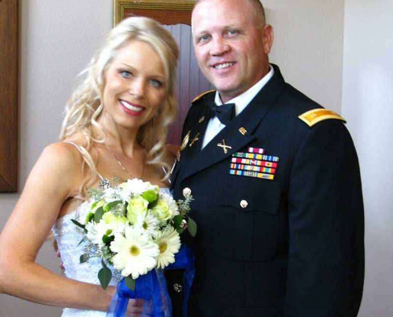 Bride with terminal illness smiles beside groom 