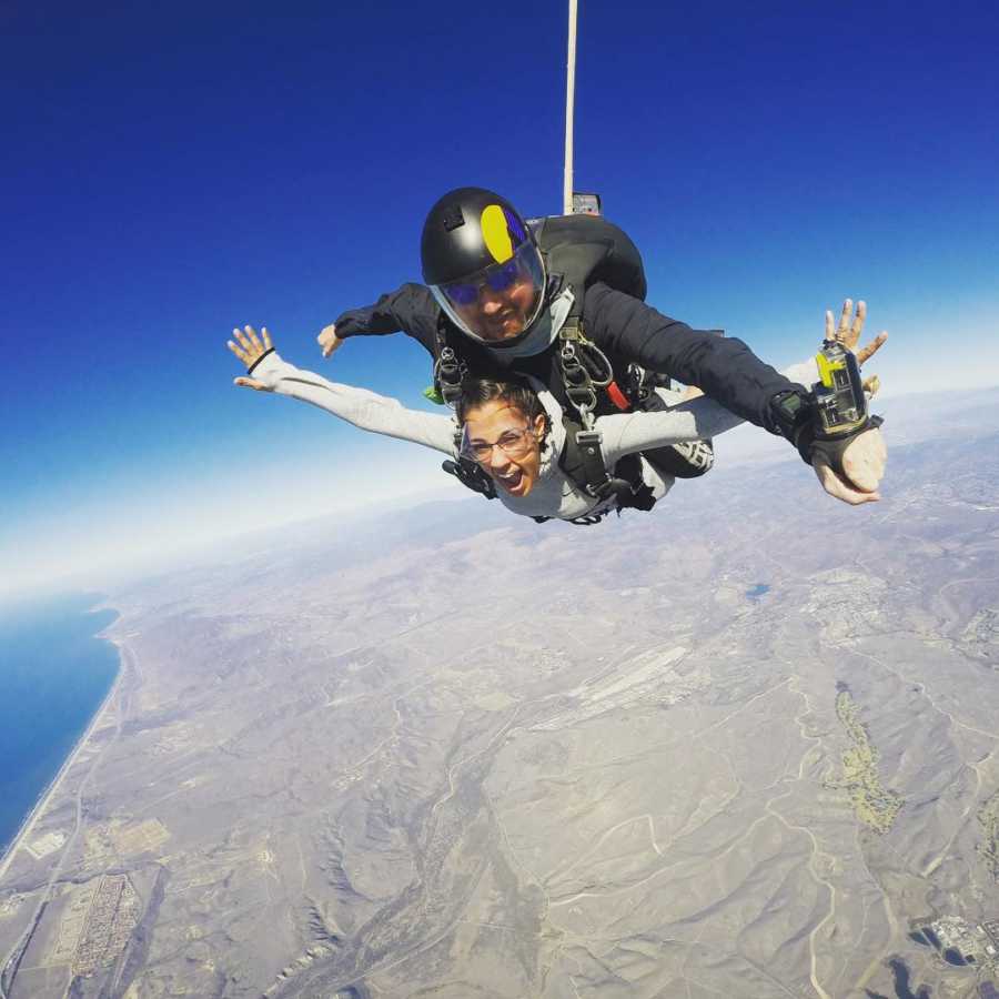 Woman who survived shooting smiles as she skydives 