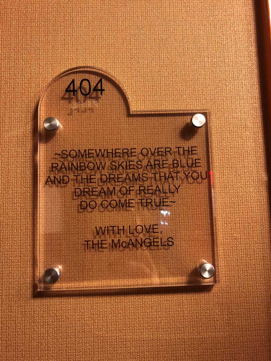 Sign for room 404 in Ronald McDonald House that quotes "Somewhere Over the Rainbow"