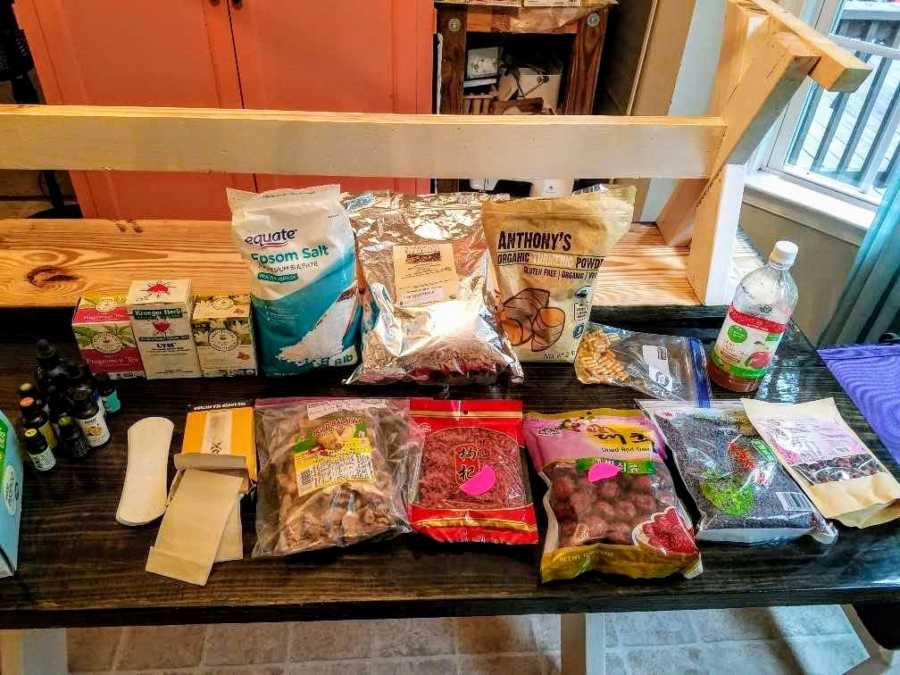 Packaged ingredients on table to help heal mother after miscarriage