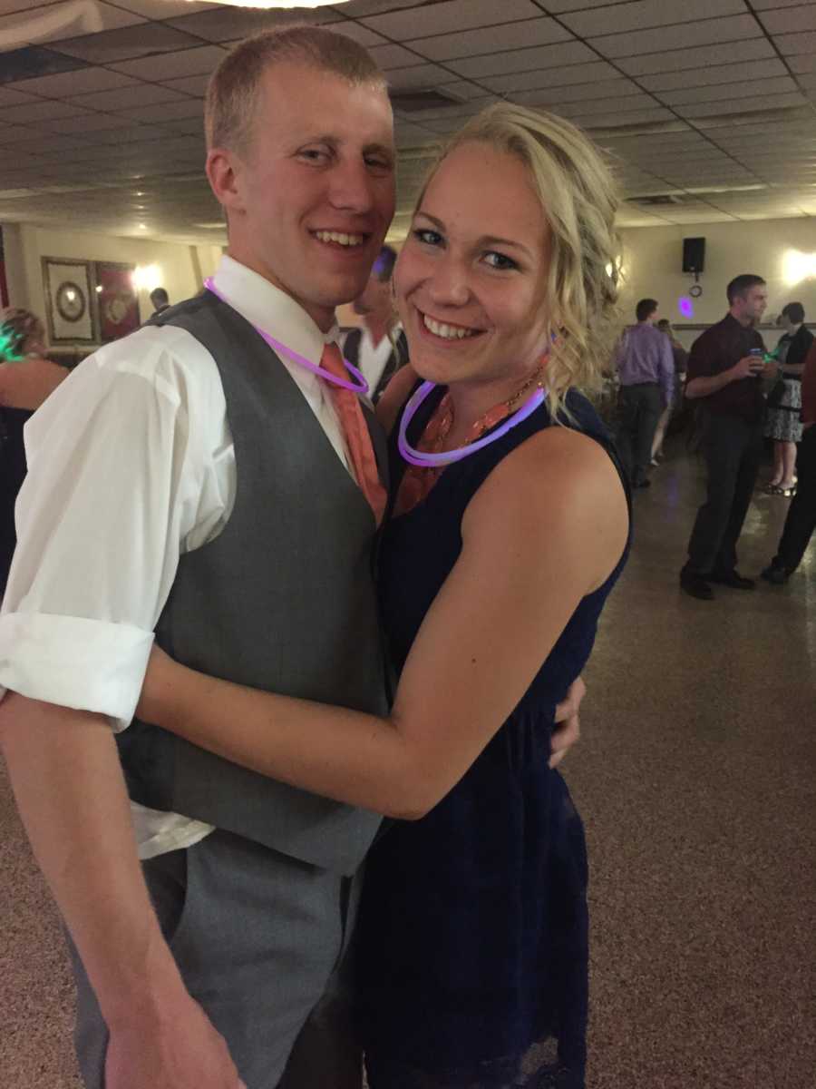 Woman who struggled to get pregnant smiles as she dances with husband at wedding reception