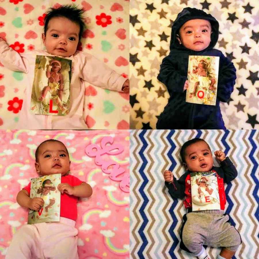 Quadruplet babies laying on their backs holding pictures of themselves the day they were born