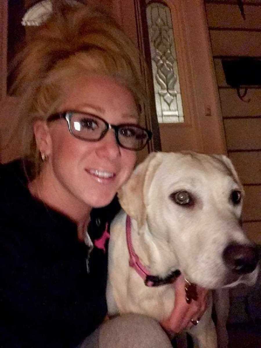 Woman who has since passed away smiles as she sits outside of home with dog