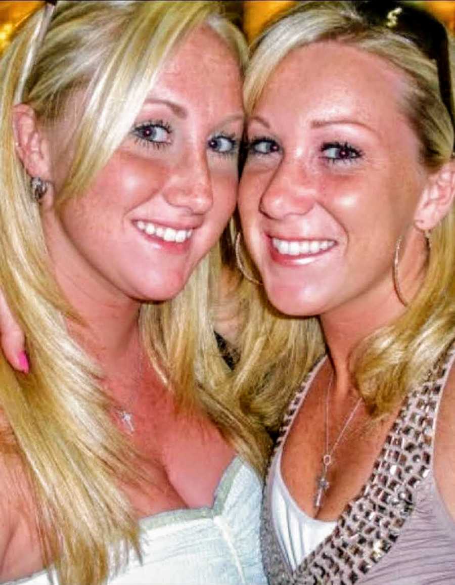 Woman smiles beside twin who has since passed away