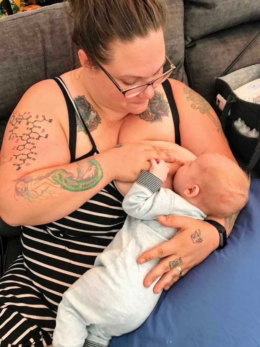 Woman breastfeeds baby boy whose mother has Hodgkin's lymphoma