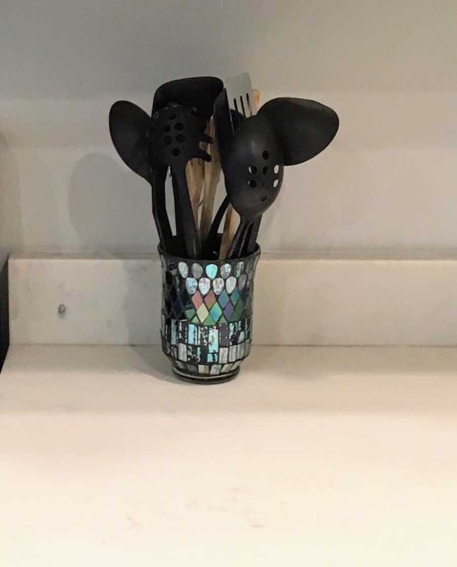 Kitchen utensils on woman's kitchen counter who doesn't want people to see her mess