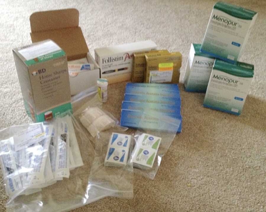 Boxes of IVF medication sitting on floor of home