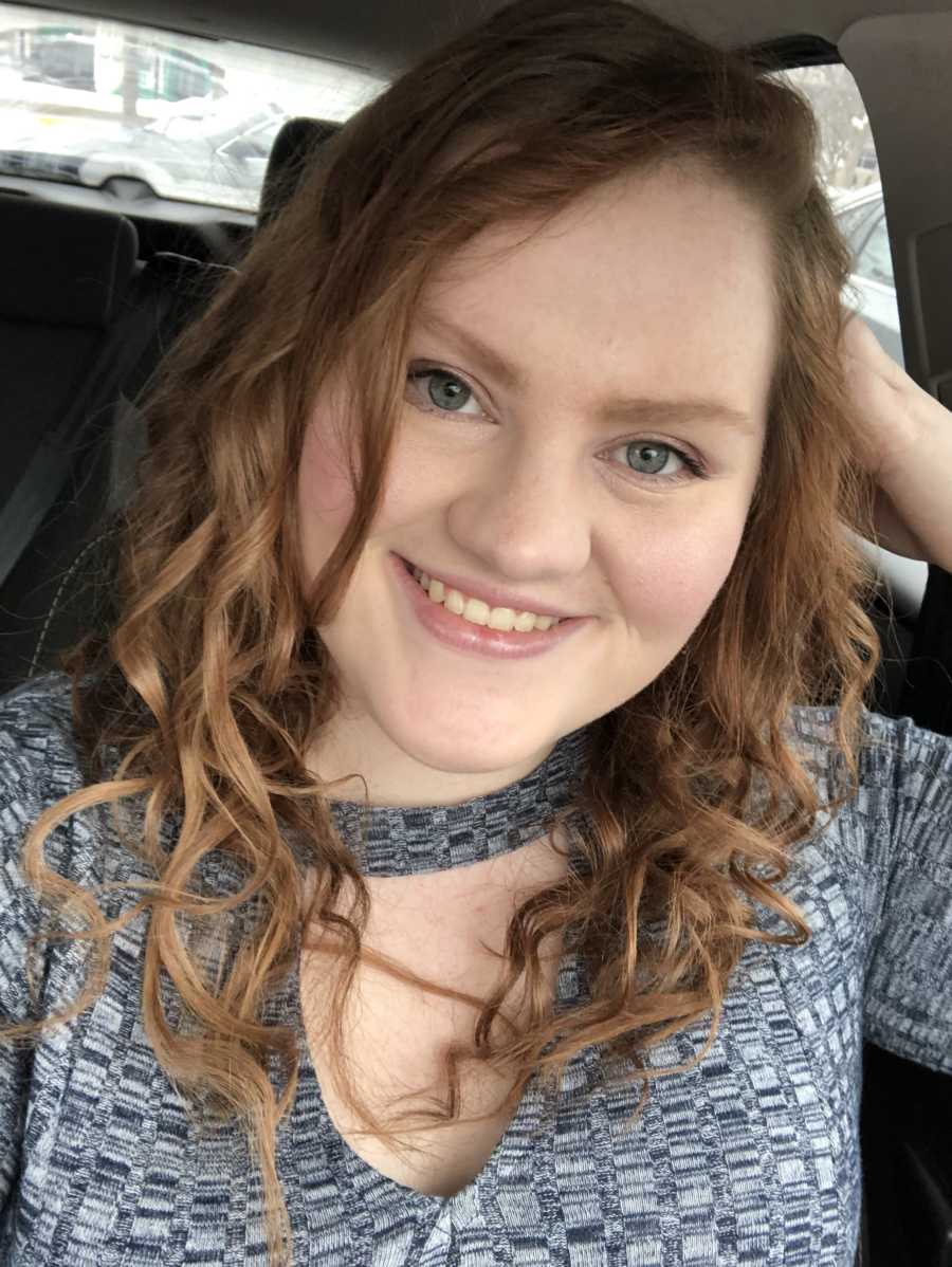 Woman who overcame severe depression smiles as she takes selfie in car