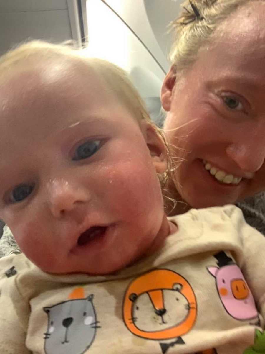 Mother and son with Ichthyosis smile in selfie on plane before they were kicked off