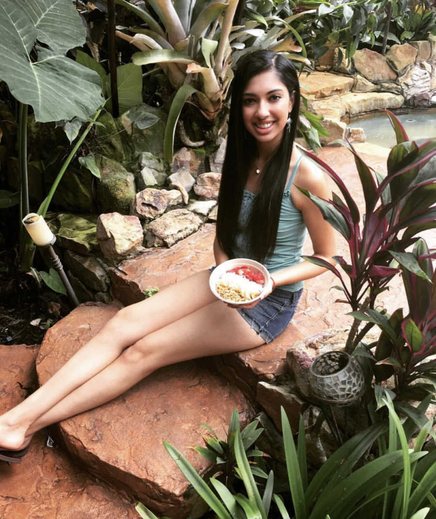 Girl with granola bowl