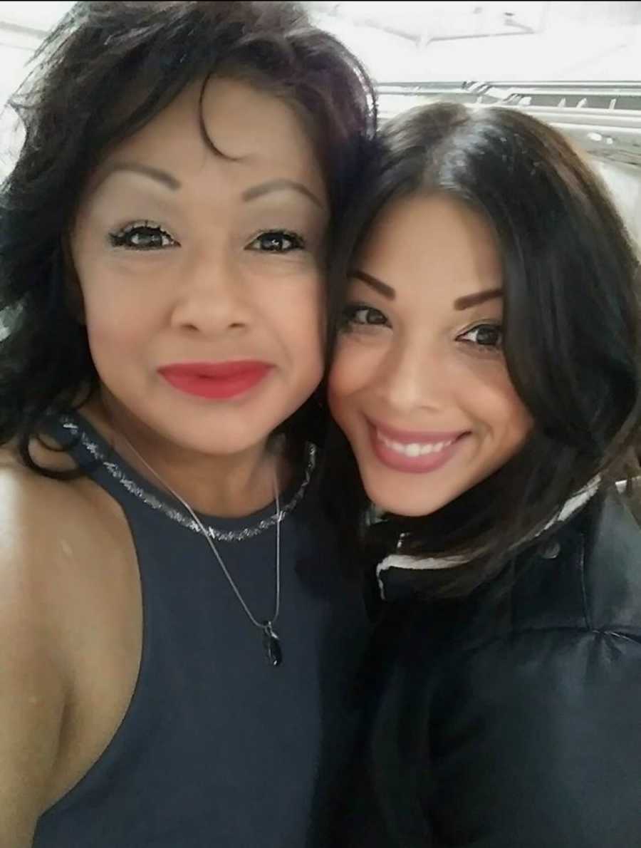 mom and daughter smiling for picture