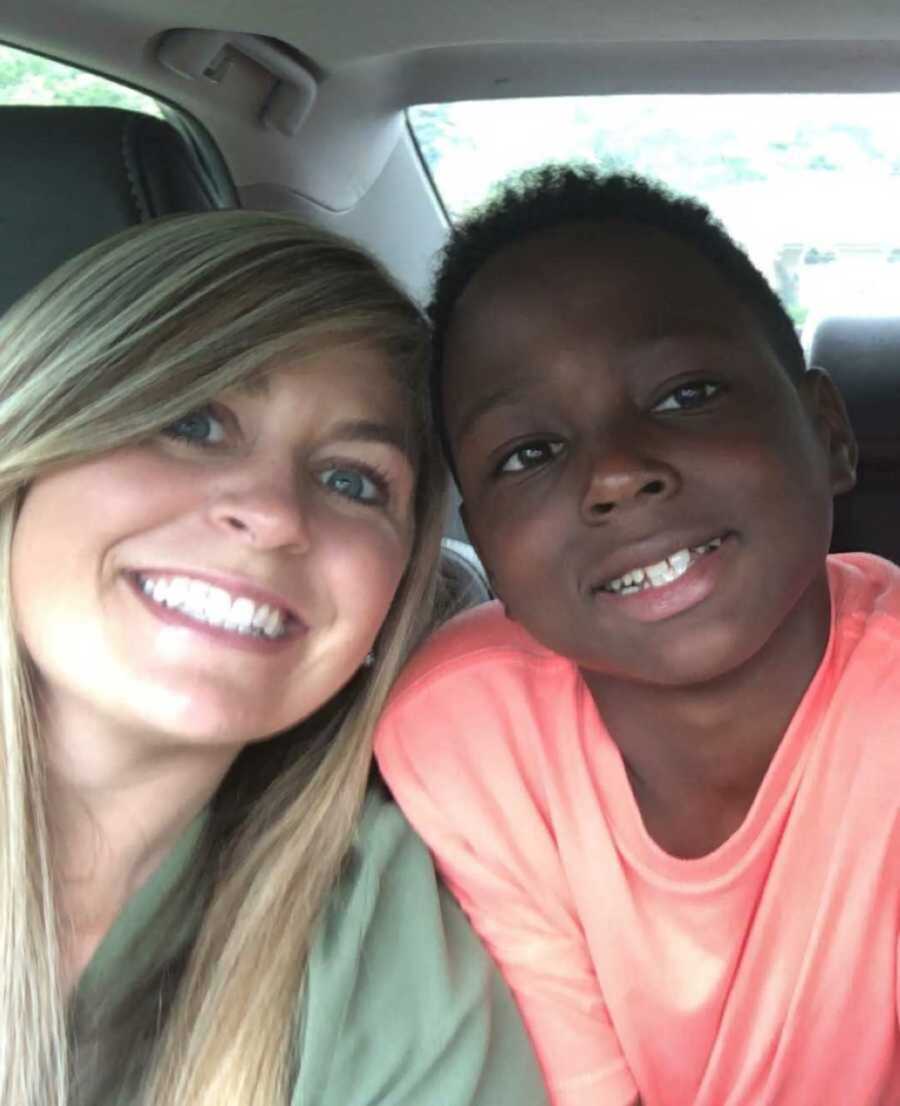 Selfie of adopted boy and mom inside car